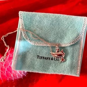 Tiffany and Co Paloma Picasso sterling silver dove pendant on 19” chain. NWOT